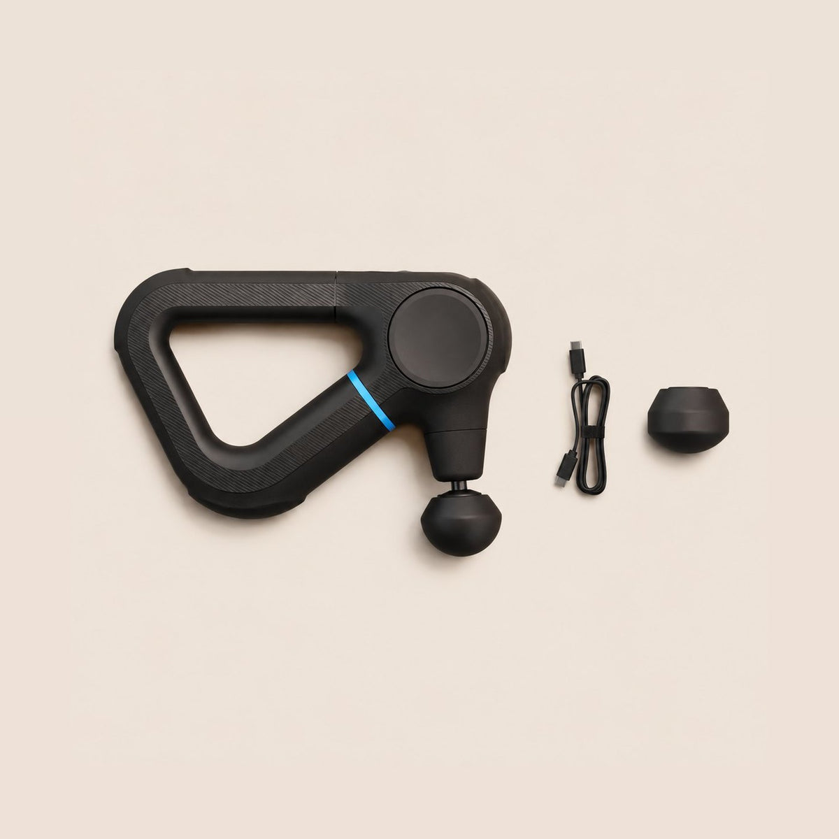 Theragun Prime mit Aufsätzen und USB-C Ladekabel